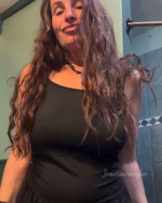 50 yo with messy hair, just leapt out of bed, have some boobs