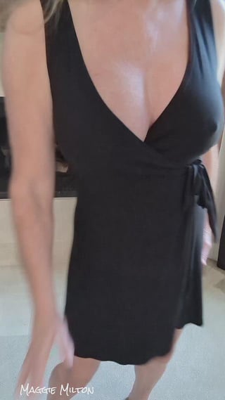 wrap dress, deep V, zero shame… this is milf cleavage