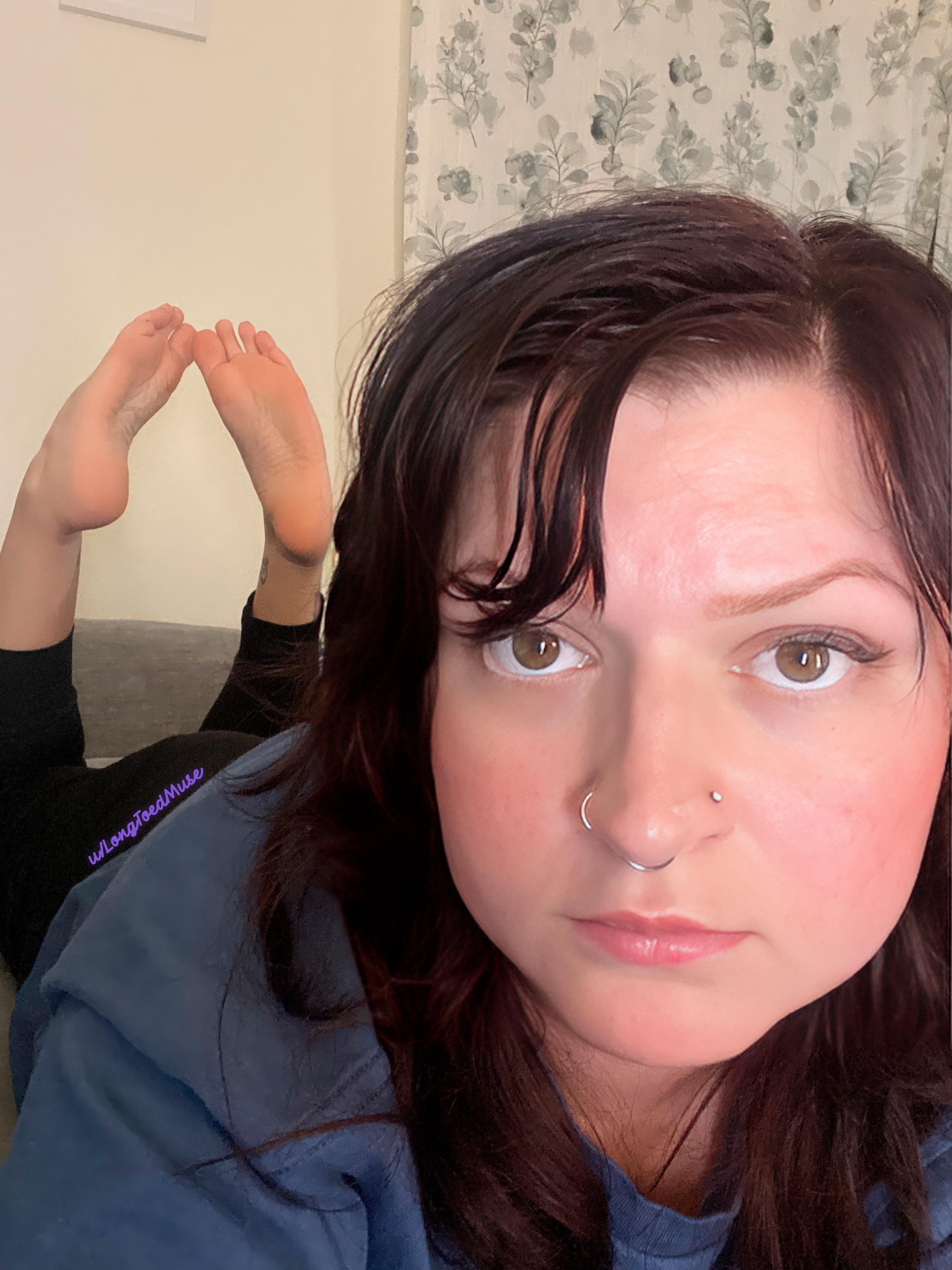 What catches your attention more? My feet or my face?